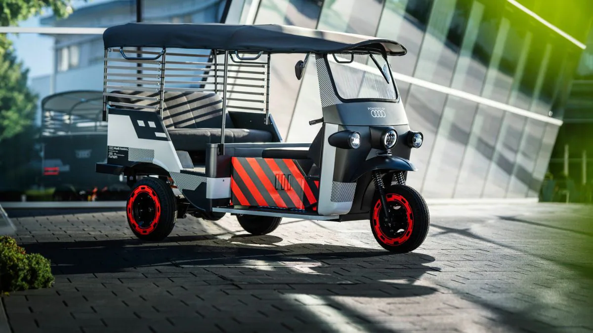 An unexpected novelty from Audi is a battery-powered tuk-tuk (an alternative name for an auto rickshaw) for India, whose design uses used batteries from Audi e-tron test electric vehicles, charged using stationary solar panels.